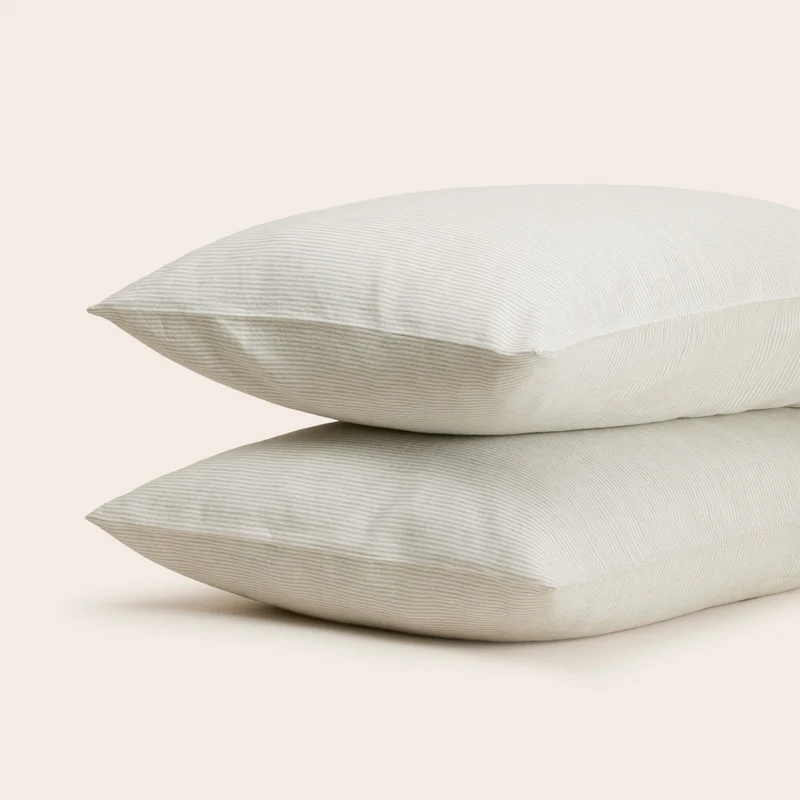 Lot de 2 taies d'oreiller FINEA ivoire et vert de gris