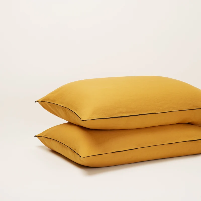 Lot de 2 taies d'oreiller CARLINA ocre et bourdon noir