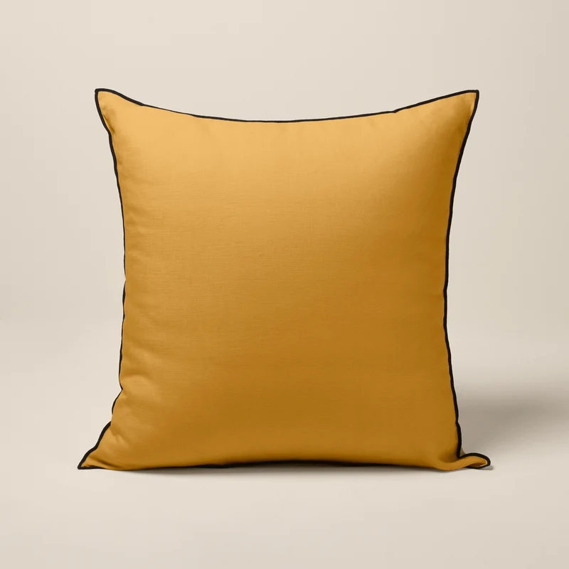 Housse de coussin CARLINA ocre et bourdon noir