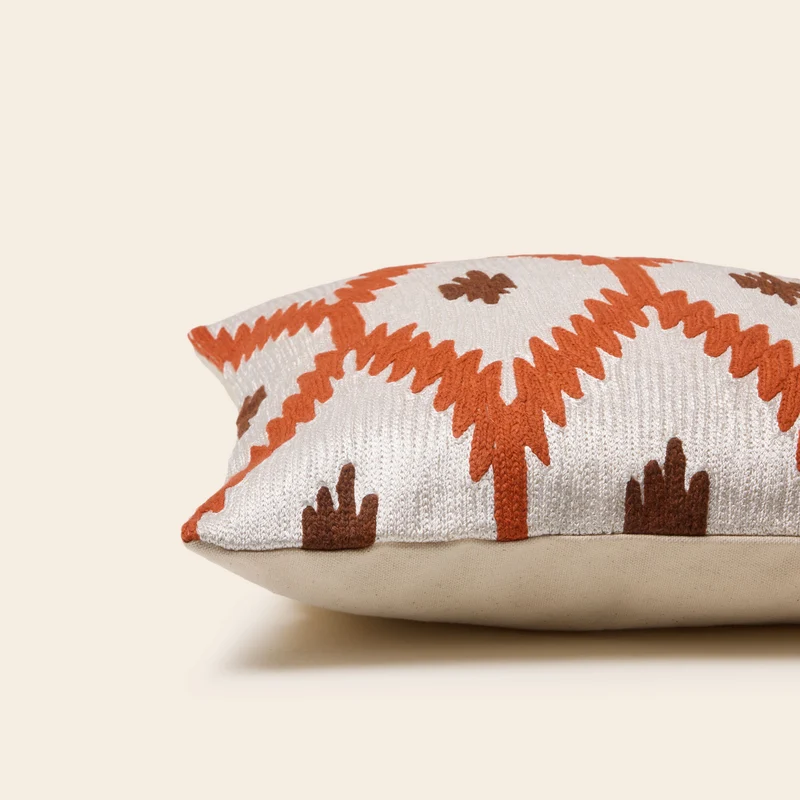 Housse de coussin JOKO ivoire et orange