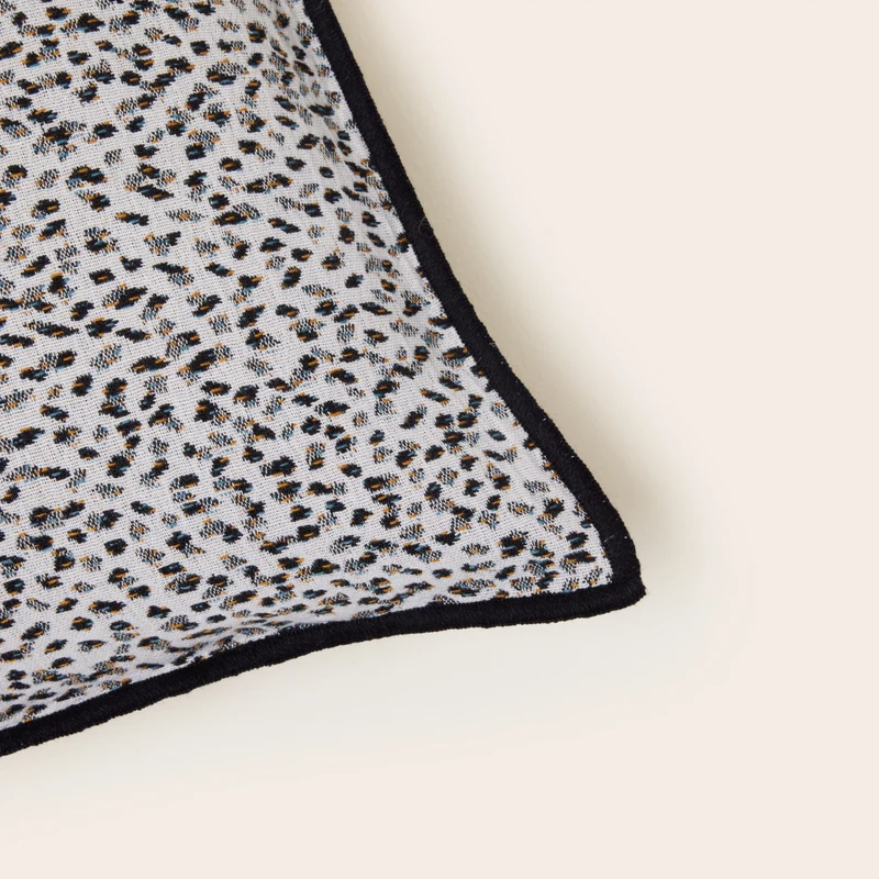 Housse de coussin OCELO noiret blanc