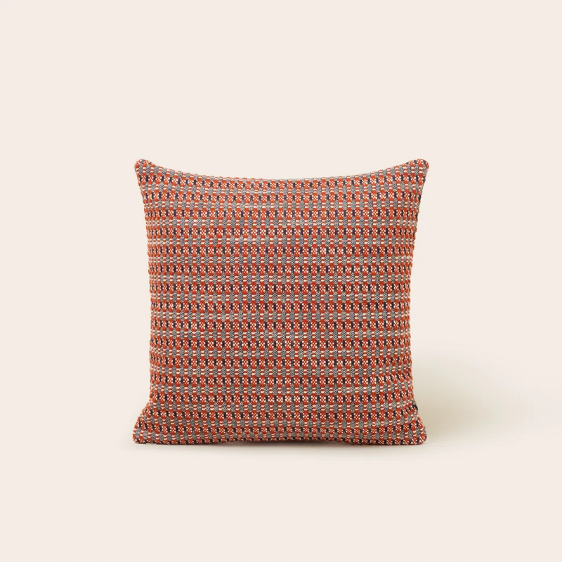 Housse de coussin EIRIK orange brûlée et orage
