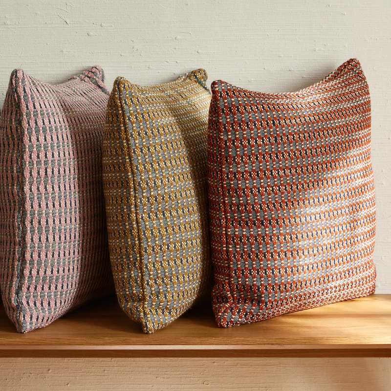 Housse de coussin EIRIK orange brûlée et orage