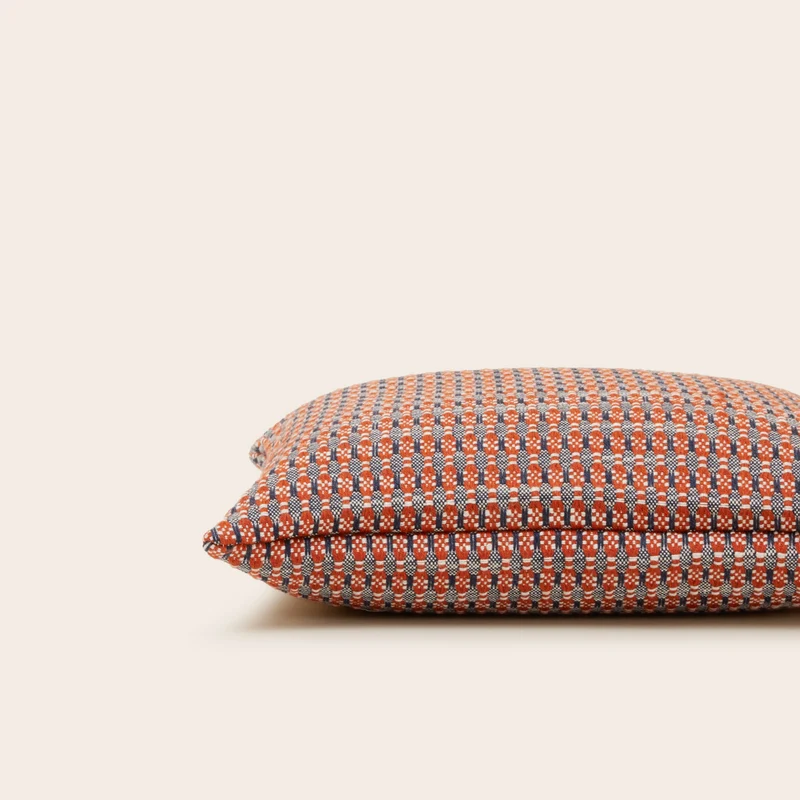 Housse de coussin EIRIK orange brûlée et orage