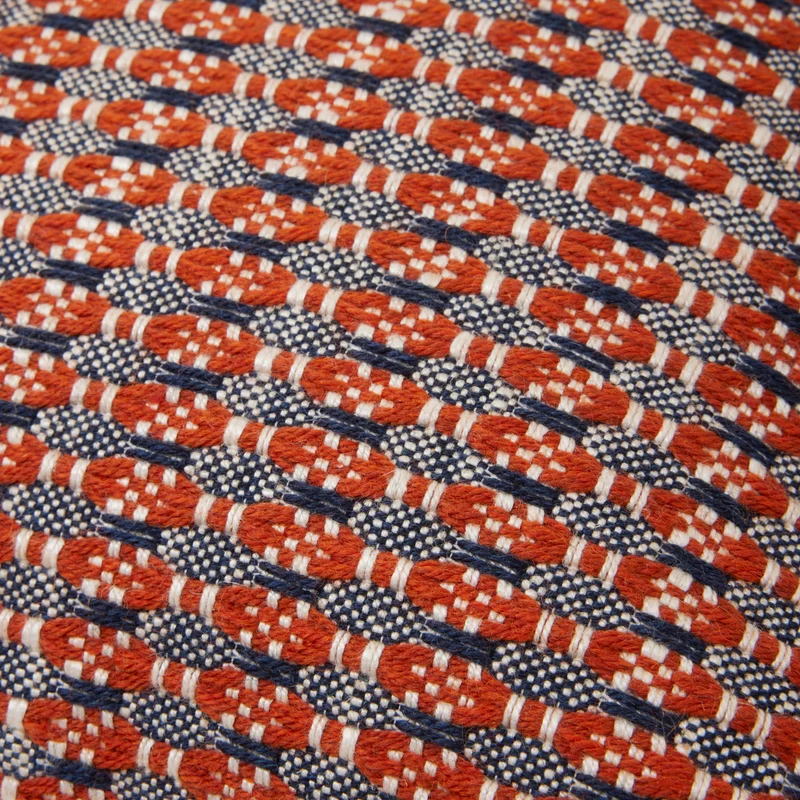 Housse de coussin EIRIK orange brûlée et orage