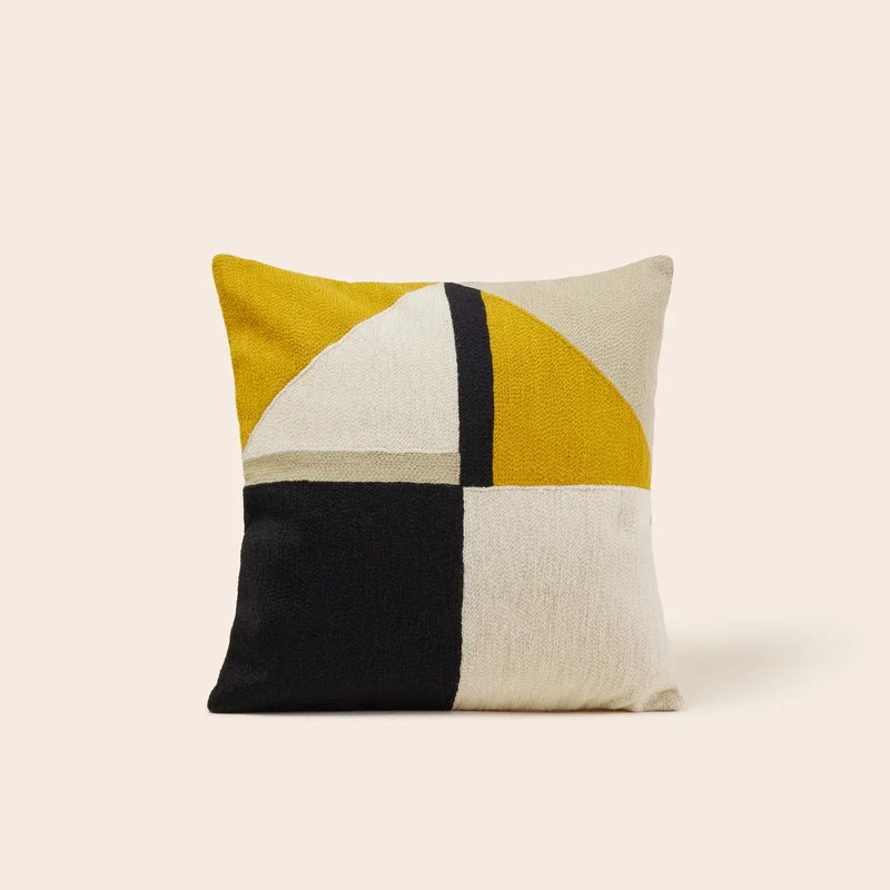 Housse de coussin TRIAGO ocre et noir