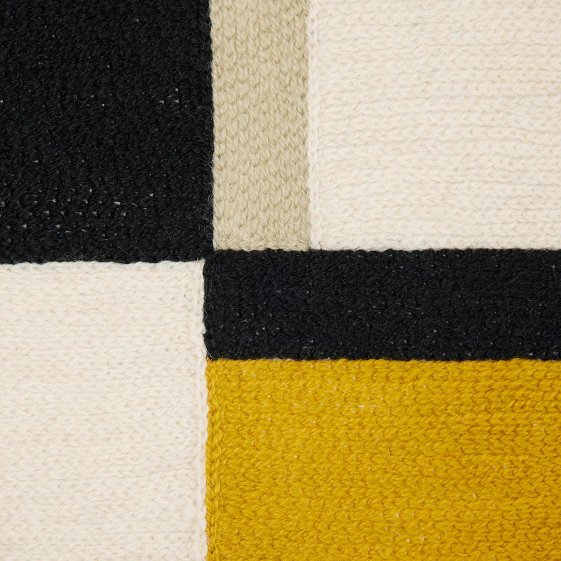 Housse de coussin TRIAGO ocre et noir