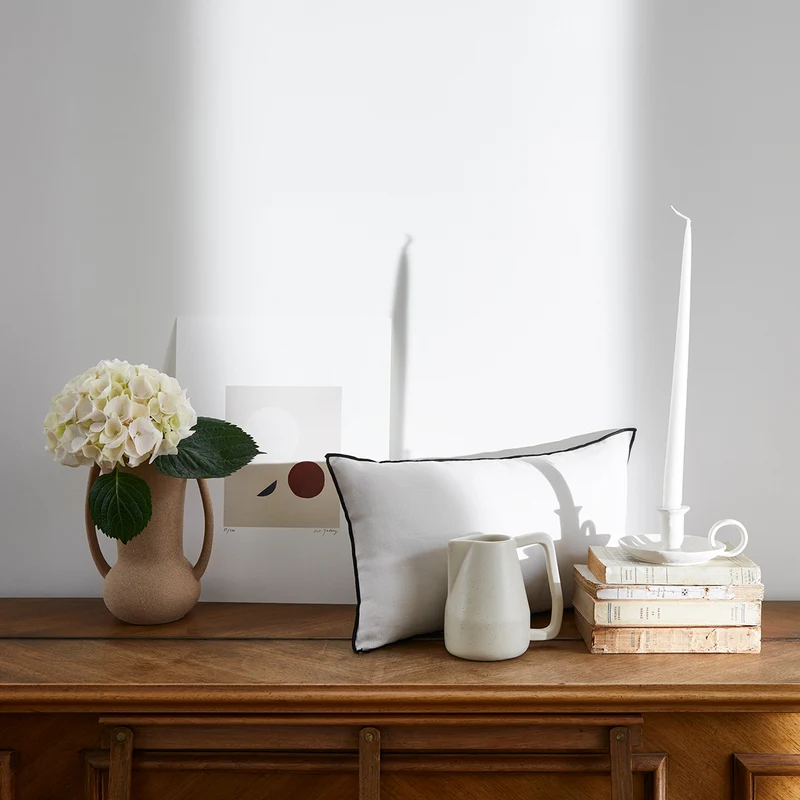 Housse de coussin CARLINA blanc pur et bourdon noir