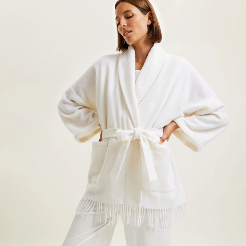 Kurzer Poncho Eponyme