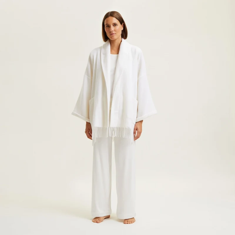 Kurzer Poncho Eponyme