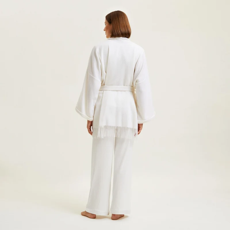 Kurzer Poncho Eponyme
