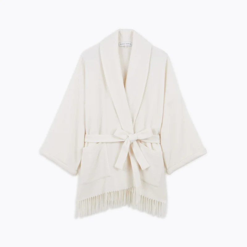 Kurzer Poncho Eponyme