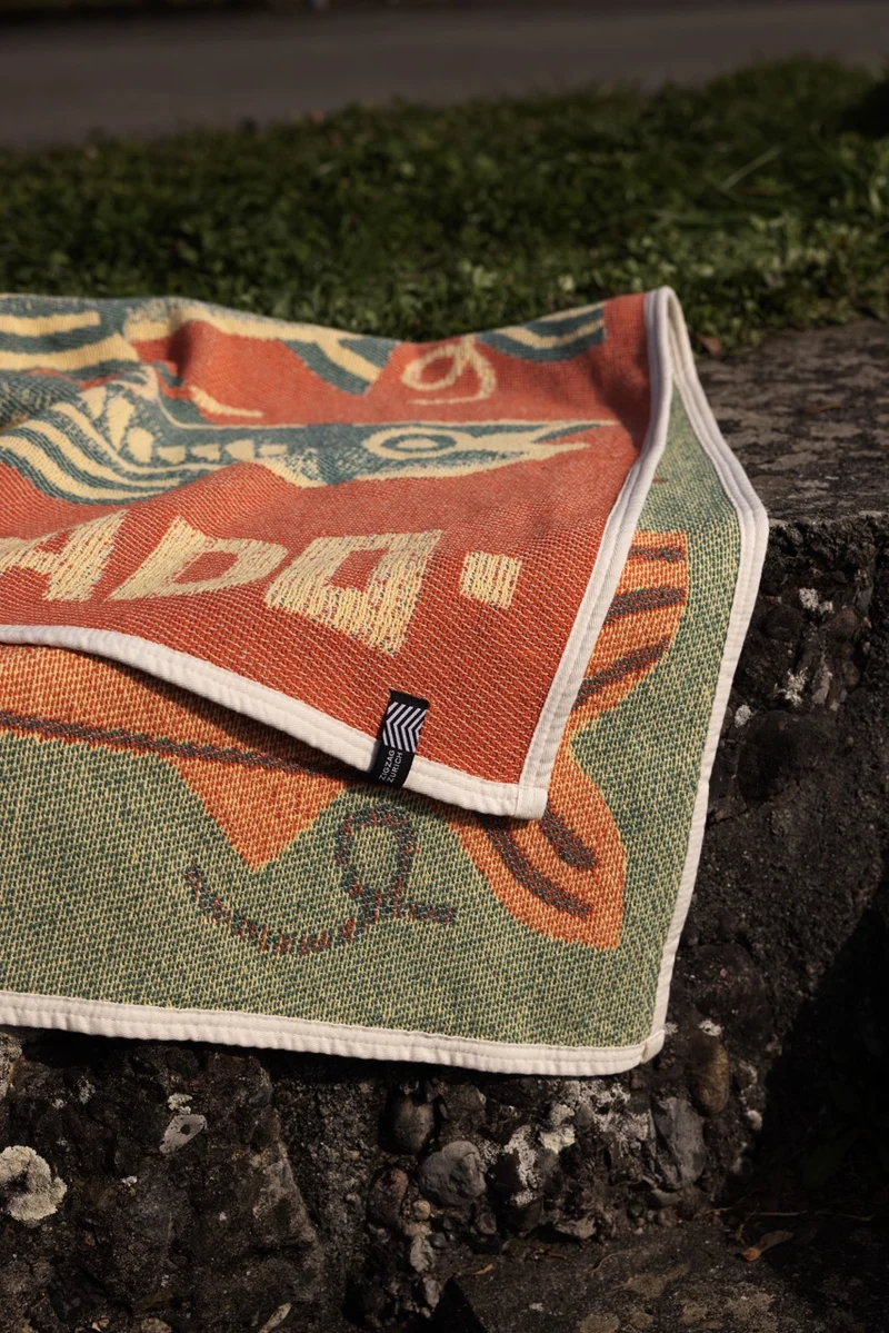 Cotton Beach Towel / Mini Blanket “El Pescado” by Florian Schommer